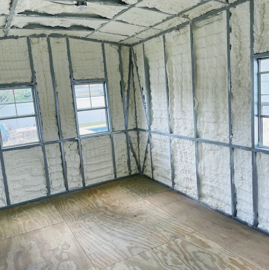 Closed-cell spray foam insulation applied to wall cavities in a residential project in Snellville